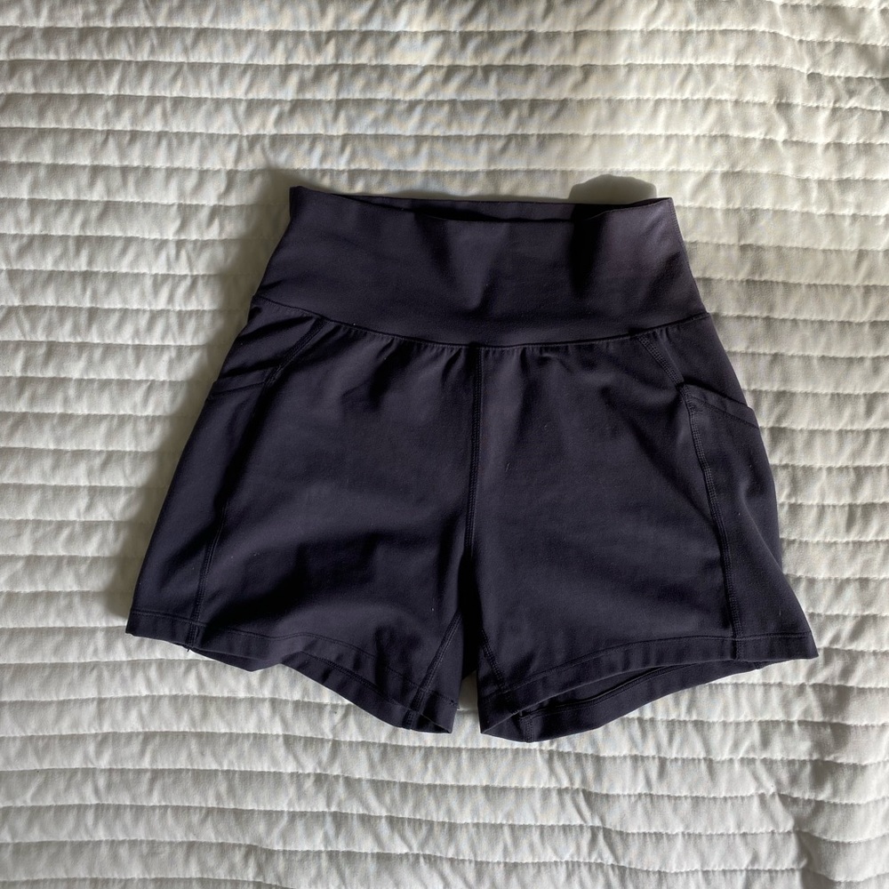 Alphalete surface shorts with pockets